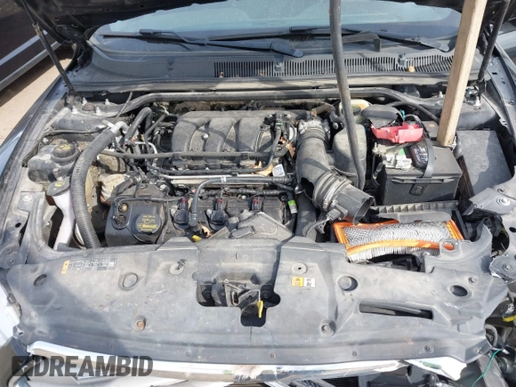 2013 Ford Taurus SEL with VIN 1FAHP2E84DG188503, listed as a IAAI auction lot 41800277 with 215,015 mi miles. Bid and sale history available at carsss.com. Image 10.