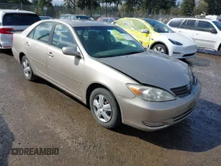 2004 Toyota Camry LE with VIN JTDBE32K440272373, listed as a IAAI auction lot 41949768 with 205,093 mi miles. Bid and sale history available at carsss.com. Image 1.