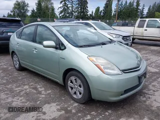 2007 Toyota Prius z VIN JTDKB20U277580905, wystawiony jako IAAI lot #42310255 z przebiegiem 160 146 mil mil oraz . Historia ofert i sprzedaży dostępna na DreamBid. Obrazek 1.