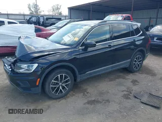 2021 Volkswagen Tiguan SE with VIN 3VV3B7AX3MM157702, listed as a IAAI auction lot 41888479 with 51,807 mi miles and . Bid and sale history available at DreamBid. Image 16.