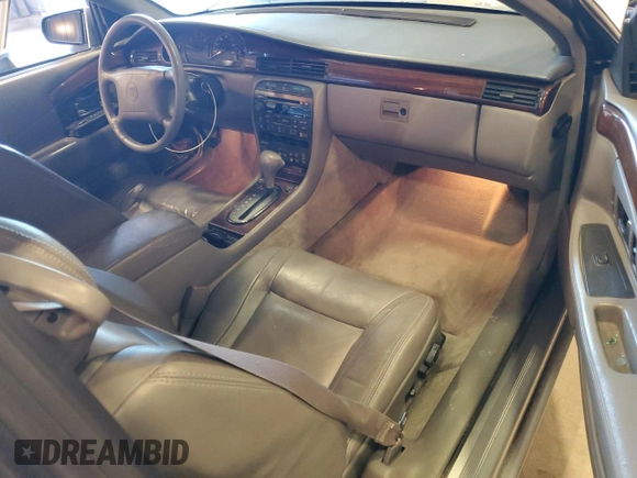 2000 Cadillac Eldorado Touring ETC z VIN 1G6ET1294YU180525, wystawiony jako Copart lot #89253455 z przebiegiem 102 230 mil mil oraz Nie do naprawy • Non repairable. Historia ofert i sprzedaży dostępna na DreamBid. Obrazek 8.