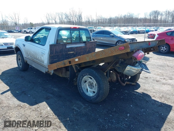 1998 Ford F-150 with VIN 1FTZF18WXWNA94968, listed as a IAAI auction lot 41867633 with 158,453 mi miles and . Bid and sale history available at DreamBid. Image 3.