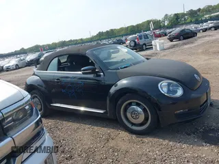 2013 Volkswagen Beetle 2.5L z VIN 3VW5X7AT5DM805978, wystawiony jako IAAI lot #42429397 z przebiegiem 62 408 mil mil oraz . Historia ofert i sprzedaży dostępna na DreamBid. Obrazek 12.