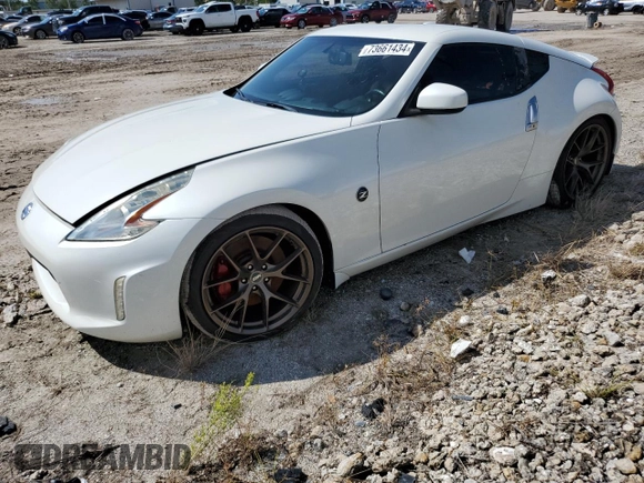 2014 Nissan 370Z Touring with VIN JN1AZ4EH0EM636520, listed as a Copart auction lot 73661434 with 0 mi miles and Salvage Title. Bid and sale history available at carsss.com. Image 1.