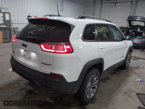 2021 Jeep Cherokee Trailhawk with VIN 1C4PJMBX8MD139644, listed as a IAAI auction lot 42419334 with 68,333 mi miles and . Bid and sale history available at DreamBid. Image 4.