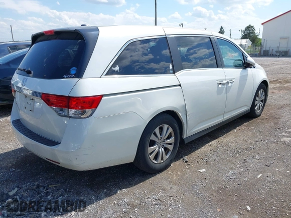 2014 Honda Odyssey EX-L with VIN 5FNRL5H69EB048867, listed as a IAAI auction lot 42190464 with 172,487 mi miles and . Bid and sale history available at carsss.com. Image 4.