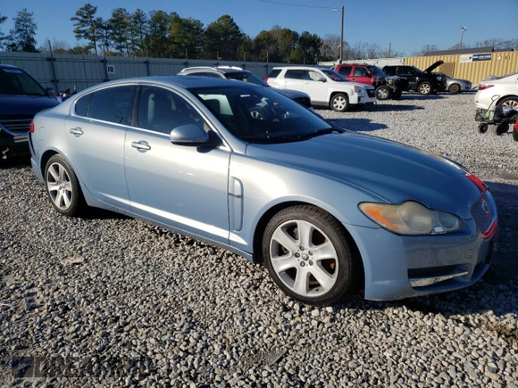 2011 Jaguar XF with VIN SAJWA0FB8BLS02474, listed as a Copart auction lot 85266644 with 156,948 mi miles and Salvage Title. Bid and sale history available at carsss.com. Image 4.