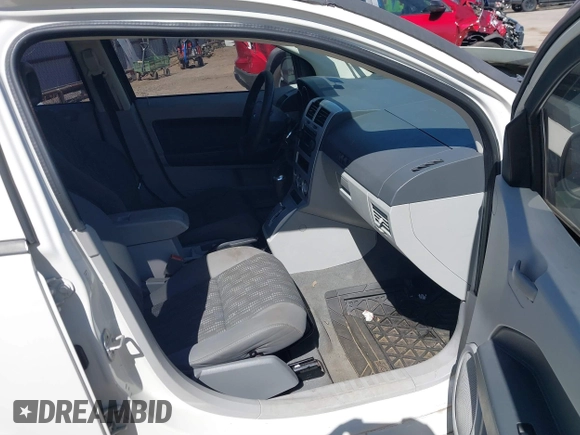 2007 Dodge Caliber SXT with VIN 1B3HB48B67D576092, listed as a IAAI auction lot 41791485 with 205,373 mi miles and . Bid and sale history available at DreamBid. Image 5.