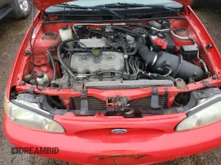 1998 Ford Escort SE z VIN 1FAFP13P9WW215988, wystawiony jako Copart lot #83483314 z przebiegiem 104 796 mil mil oraz Szkody całkowita. Historia ofert i sprzedaży dostępna na DreamBid. Obrazek 11.