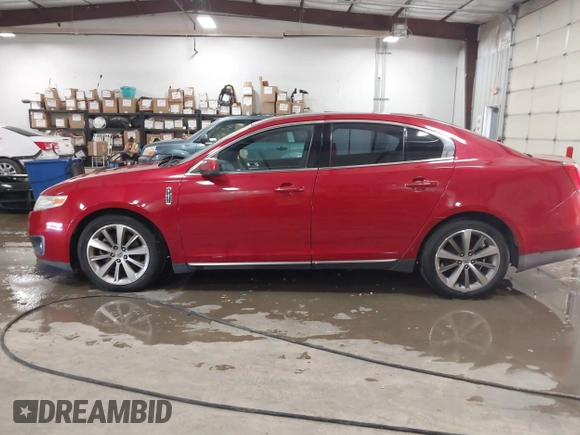2009 Lincoln MKS with VIN 1LNHM94R59G610559, listed as a IAAI auction lot 41704552 with 168,556 mi miles. Bid and sale history available at carsss.com. Image 14.