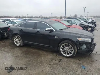 2013 Ford Taurus Limited z VIN 1FAHP2F80DG216618, wystawiony jako Copart lot #85572994 z przebiegiem 185 697 mil mil oraz Szkoda całkowita • Salvage title. Historia ofert i sprzedaży dostępna na DreamBid. Obrazek 4.