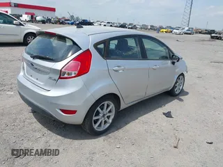 2019 Ford Fiesta SE z VIN 3FADP4EJ9KM107124, wystawiony jako IAAI lot #42067464 z przebiegiem 89 076 mil mil oraz . Historia ofert i sprzedaży dostępna na DreamBid. Obrazek 4.