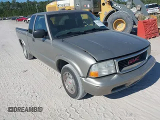 2003 GMC Sonoma SLS z VIN 1GTCS19X638129914, wystawiony jako IAAI lot #42048299 z przebiegiem 169 901 mil mil oraz . Historia ofert i sprzedaży dostępna na DreamBid. Obrazek 1.