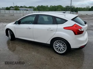 2014 Ford Focus Titanium with VIN 1FADP3N28EL418651, listed as a Copart auction lot 56723475 with 94,773 mi miles and Salvage title. Bid and sale history available at DreamBid. Image 2.