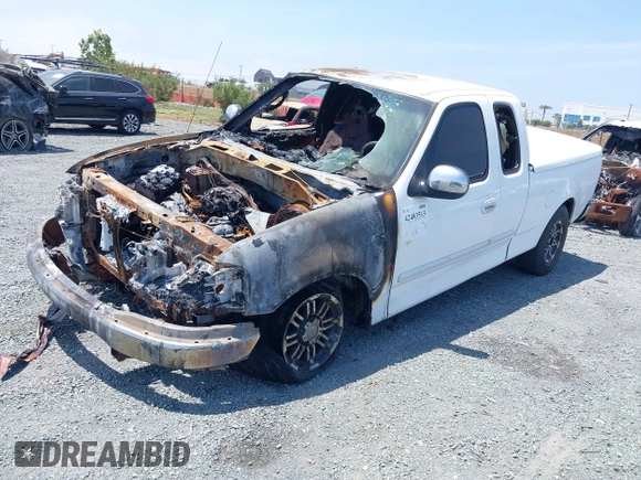 2001 Ford F-150 XL with VIN 1FTZX17261KF26378, listed as a IAAI auction lot 42483513 with Not provided miles and . Bid and sale history available at DreamBid. Image 2.