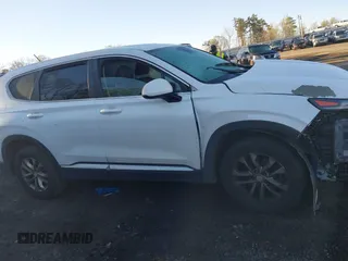 2019 Hyundai Santa Fe SE with VIN 5NMS2CAD6KH114027, listed as a IAAI auction lot 41874556 with 125,729 mi miles. Bid and sale history available at carsss.com. Image 13.