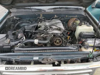 1996 Toyota T100 DX z VIN JT4TN12D2T0026690, wystawiony jako Copart lot #52937955 z przebiegiem 287 729 mil mil oraz Tytuł czysty. Historia ofert i sprzedaży dostępna na DreamBid. Obrazek 11.