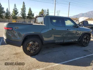2022 Rivian R1T Launch Edition z VIN 7FCTGAAL3NN003101, wystawiony jako Copart lot #85602634 z przebiegiem 17 189 mil mil oraz Szkoda całkowita • Salvage title. Historia ofert i sprzedaży dostępna na DreamBid. Obrazek 3.