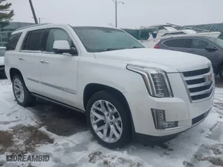 2016 Cadillac Escalade Premium Collection with VIN 1GYS4CKJ8GR168005, listed as a IAAI auction lot 41304652 with 64,257 mi miles. Bid and sale history available at carsss.com. Image 1.