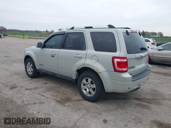 2008 Ford Escape Limited with VIN 1FMCU94108KB33023, listed as a IAAI auction lot 41956715 with 144,421 mi miles. Bid and sale history available at carsss.com. Image 3.