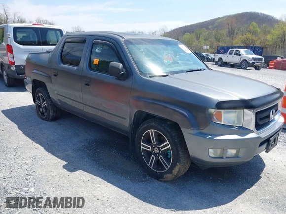 2009 Honda Ridgeline RTL with VIN 2HJYK16539H503533, listed as a IAAI auction lot 42040423 with 206,102 mi miles and . Bid and sale history available at DreamBid. Image 1.