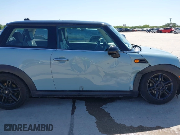 2013 MINI Hardtop with VIN WMWSU3C57DT690398, listed as a IAAI auction lot 41989221 with 112,954 mi miles and . Bid and sale history available at DreamBid. Image 13.