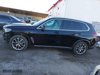 2023 BMW X5 sDrive40i with VIN 5UXCR4C06P9N83023, listed as a IAAI auction lot 41513687 with 42,211 mi miles. Bid and sale history available at carsss.com. Image 15.