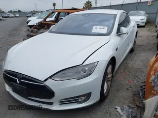 2016 Tesla Model S 90D with VIN 5YJSA1E40GF123543, listed as a IAAI auction lot 42111603 with 126,445 mi miles and . Bid and sale history available at DreamBid. Image 2.