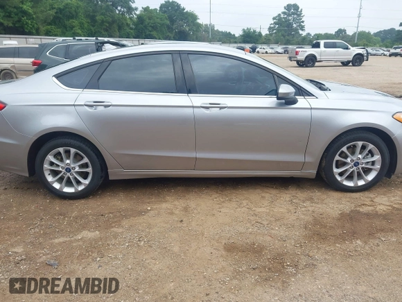 2020 Ford Fusion SE z VIN 3FA6P0LU4LR148070, wystawiony jako IAAI lot #42262446 z przebiegiem 69 057 mil mil oraz . Historia ofert i sprzedaży dostępna na DreamBid. Obrazek 13.