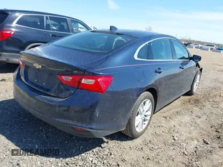 2018 Chevrolet Malibu LT with VIN 1G1ZD5ST4JF206025, listed as a IAAI auction lot 42081714 with 65,069 mi miles and . Bid and sale history available at carsss.com. Image 4.