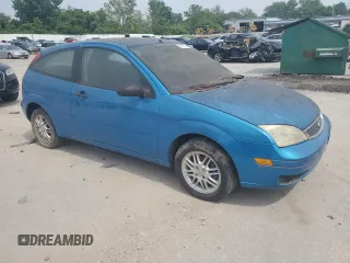 2007 Ford Focus S z VIN 1FAFP31N77W138844, wystawiony jako Copart lot #60702195 z przebiegiem Nie podano mil oraz Czysty tytuł • Clean title. Historia ofert i sprzedaży dostępna na DreamBid. Obrazek 4.