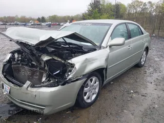 2007 Toyota Avalon XL with VIN 4T1BK36B27U236094, listed as a IAAI auction lot 42025285 with 208,741 mi miles and . Bid and sale history available at carsss.com. Image 2.