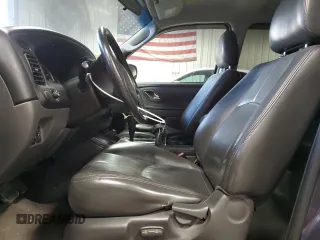 2005 Mazda Tribute i with VIN 4F2YZ92Z55KM31146, listed as a Copart auction lot 42934565 with 81,657 mi miles and Non Repairable. Bid and sale history available at carsss.com. Image 7.
