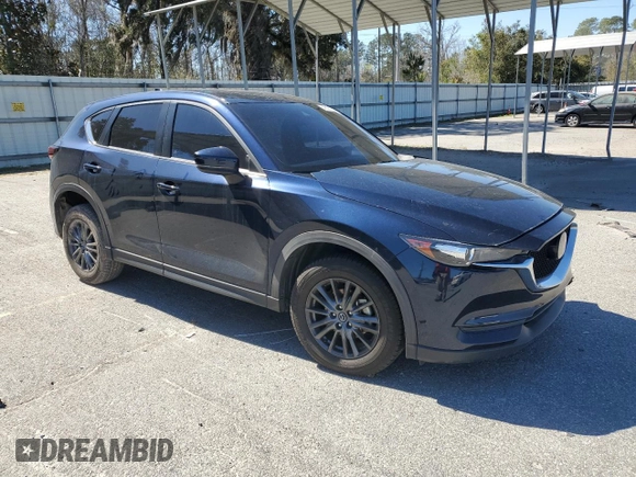 2021 Mazda CX-5 Touring with VIN JM3KFACM1M0442455, listed as a Copart auction lot 48187985 with 49,970 mi miles and Salvage Title. Bid and sale history available at carsss.com. Image 4.