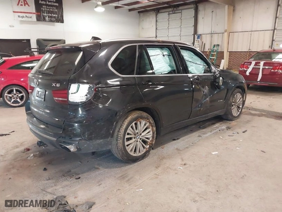 2016 BMW X5 eDrive xDrive40e with VIN 5UXKT0C51G0S74923, listed as a IAAI auction lot 41282150 with 110,135 mi miles. Bid and sale history available at carsss.com. Image 4.