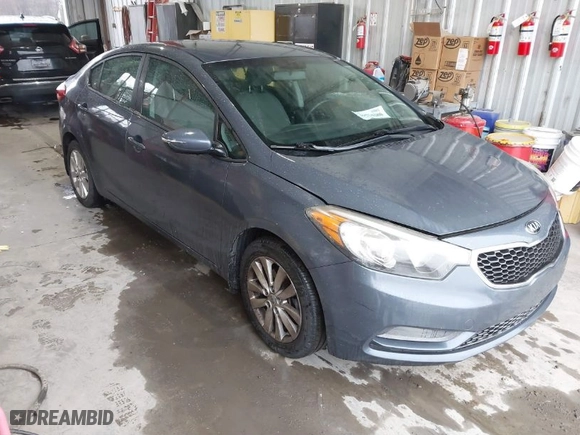 2014 Kia Forte LX with VIN KNAFX4A69E5237321, listed as a IAAI auction lot 41534280 with 100,810 mi miles. Bid and sale history available at carsss.com. Image 1.