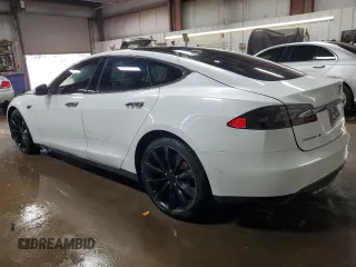 2015 Tesla Model S 85D with VIN 5YJSA1H24FF092628, listed as a Copart auction lot 51959035 with 128,744 mi miles and Salvage Title. Bid and sale history available at carsss.com. Image 2.