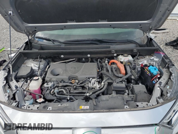 2021 Toyota RAV4 Hybrid XSE with VIN 2T3E6RFVXMW020561, listed as a Copart auction lot 64822005 with 39,434 mi miles and Salvage title. Bid and sale history available at DreamBid. Image 12.