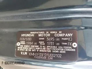 2000 Hyundai Elantra GLS z VIN KMHJF35F3YU002102, wystawiony jako Copart lot #73243004 z przebiegiem 79 155 mil mil oraz Szkoda całkowita • Salvage title. Historia ofert i sprzedaży dostępna na DreamBid. Obrazek 14.