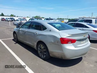 2017 Chevrolet Impala LT with VIN 2G1105S31H9197165, listed as a IAAI auction lot 42303730 with 232,046 mi miles and . Bid and sale history available at DreamBid. Image 3.