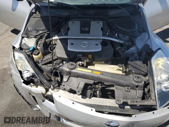 2007 Nissan 350Z Enthusiast z VIN JN1BZ36AX7M651304, wystawiony jako Copart lot #57164945 z przebiegiem 83 332 mil mil oraz Szkoda całkowita • Salvage title. Historia ofert i sprzedaży dostępna na DreamBid. Obrazek 11.