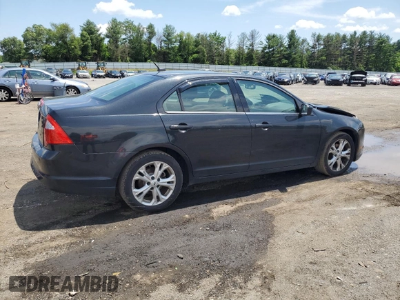 2012 Ford Fusion SE z VIN 3FAHP0HA7CR306411, wystawiony jako Copart lot #60476635 z przebiegiem 173 779 mil mil oraz Szkoda całkowita • Salvage title. Historia ofert i sprzedaży dostępna na DreamBid. Obrazek 3.
