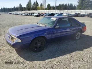 1987 Ford Mustang with VIN 1FABP41E7HF149719, listed as a Copart auction lot 51951255 with 75,117 mi miles and Salvage title. Bid and sale history available at DreamBid. Image 1.