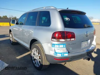 2010 Volkswagen Touareg VR6 with VIN WVGBF7A92AD001704, listed as a IAAI auction lot 41751316 with 80,597 mi miles and . Bid and sale history available at DreamBid. Image 3.