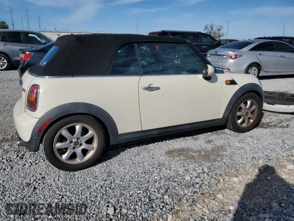2010 MINI Convertible with VIN WMWMR3C55ATU97172, listed as a Copart auction lot 42726215 with 99,164 mi miles and Salvage Title. Bid and sale history available at DreamBid. Image 3.