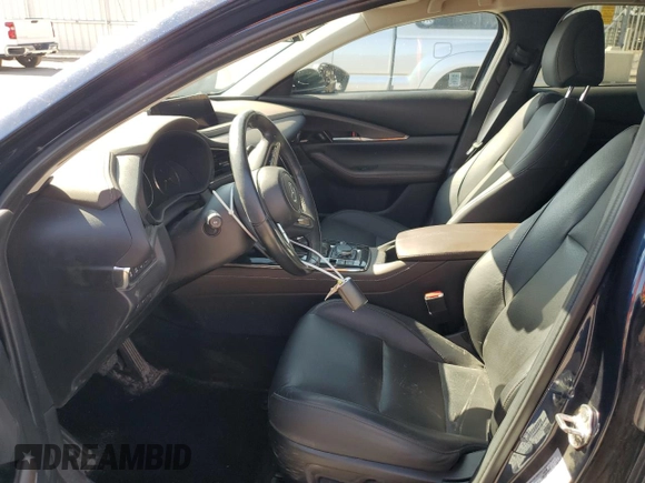 2023 Mazda CX-30 Premium Plus with VIN 3MVDMBEY9PM500907, listed as a Copart auction lot 70871494 with 38,599 mi miles and Salvage title. Bid and sale history available at DreamBid. Image 7.