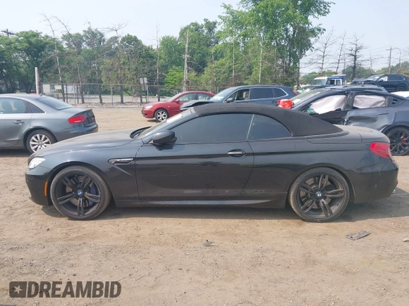 2014 BMW M6 z VIN WBSLZ9C5XEDZ78402, wystawiony jako IAAI lot #42399055 z przebiegiem 127 803 mil mil oraz . Historia ofert i sprzedaży dostępna na DreamBid. Obrazek 14.