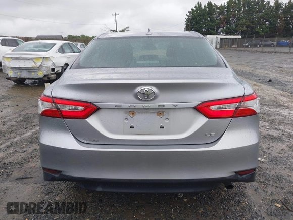 2019 Toyota Camry LE z VIN 4T1B11HK0KU698215, wystawiony jako IAAI lot #42319699 z przebiegiem 54 864 mil mil oraz . Historia ofert i sprzedaży dostępna na DreamBid. Obrazek 17.