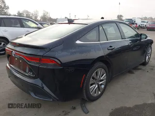 2022 Toyota Mirai XLE with VIN JTDAAAAA8NA005110, listed as a IAAI auction lot 41174928 with 30,151 mi miles and . Bid and sale history available at DreamBid. Image 4.