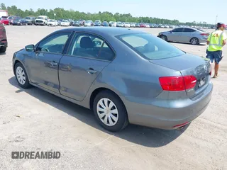 2014 Volkswagen Jetta S with VIN 3VW2K7AJ2EM328671, listed as a IAAI auction lot 42603027 with 156,137 mi miles and . Bid and sale history available at DreamBid. Image 3.